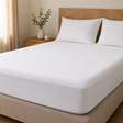 Alèse housse imperméable lavable sur un lit