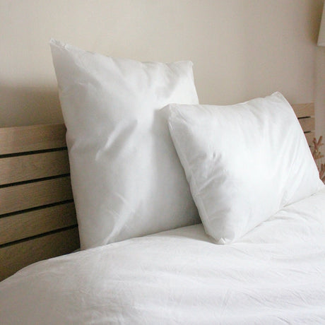 Oreiller Jetable Confort sur un lit