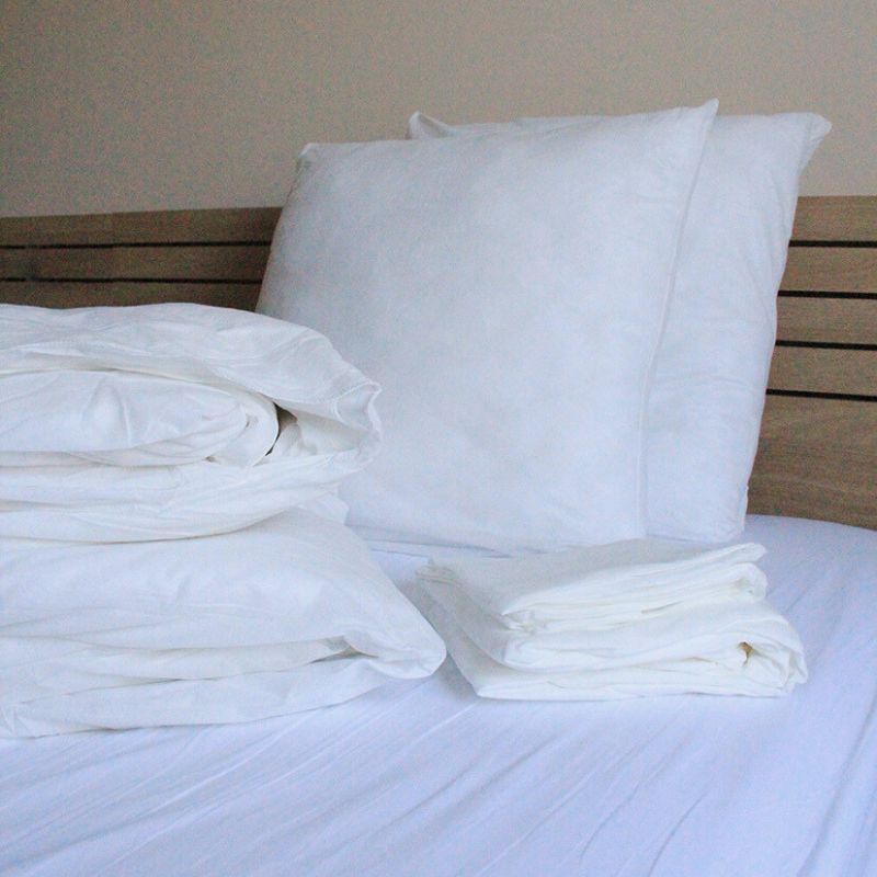 Parure Housse De Couette Biodegradable Prestige sur un lit